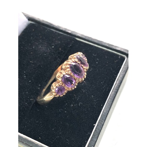 114 - 9ct gold amethyst graduated 5 stone ring weight 2.5g