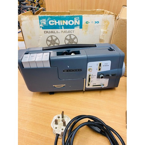 12 - Boxed Chinon 300-c and a eumig mark 610 d both untested without reels