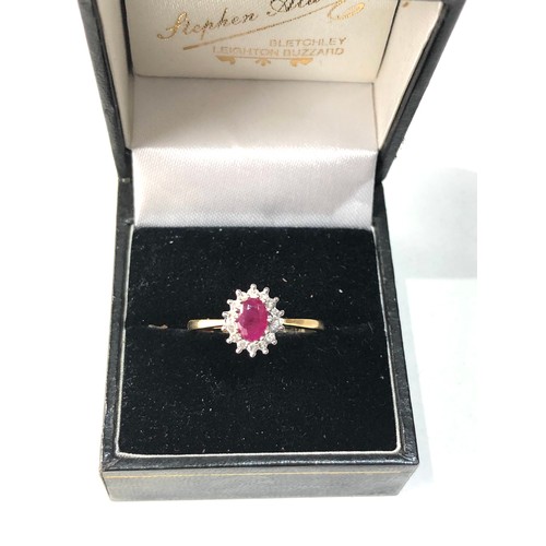 138 - 9ct gold ruby & diamond halo ring weight 2g