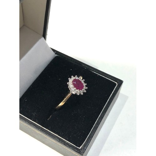 138 - 9ct gold ruby & diamond halo ring weight 2g