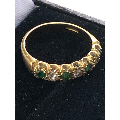 134 - 18ct gold emerald diamond half eternity ring weight 3.8g