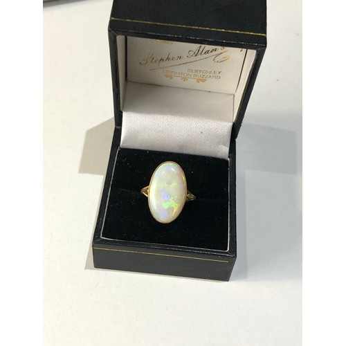 153 - 18ct gold large opal ring opal measures approx 18mm by 11mm ring weight 3.6g