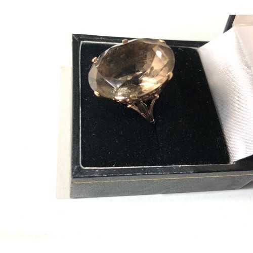 127 - 9ct gold smokey quartz large cocktail ring weight 7.7g