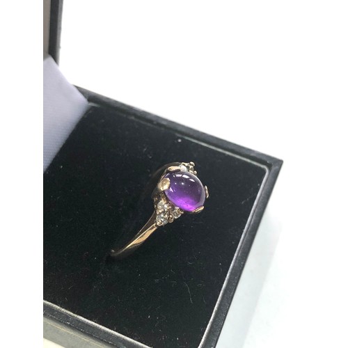 155 - 9ct gold cabachon amethyst ring weight 2.3g