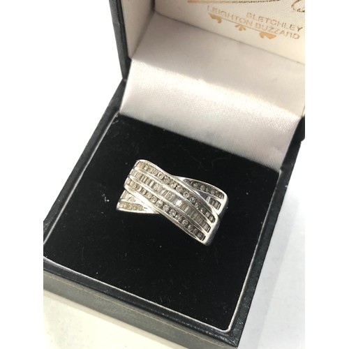 126 - white gold mixed cut diamond cross over ring 0.50ct weight 4.3g