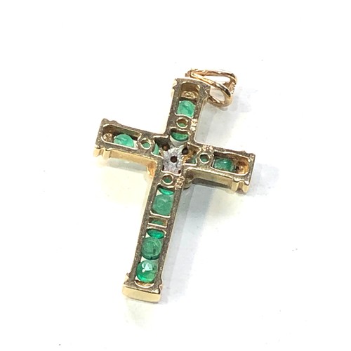 208 - 14ct gold emerald & diamond cross pendant measures approx 3.4cm drop bty 1.9cm wide weight 3.2g