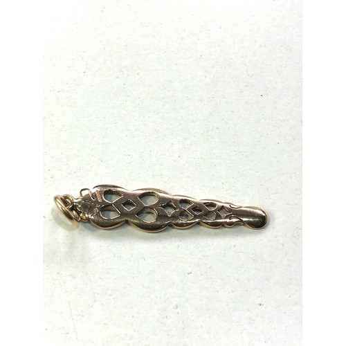 207 - 9ct gold celtic spoon design  pendant measures approx 4.2cm drop weight 3.8g