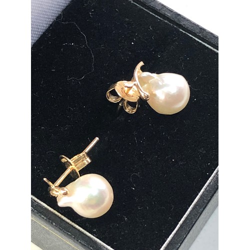 183 - 14ct gold baroque pearl pear studs