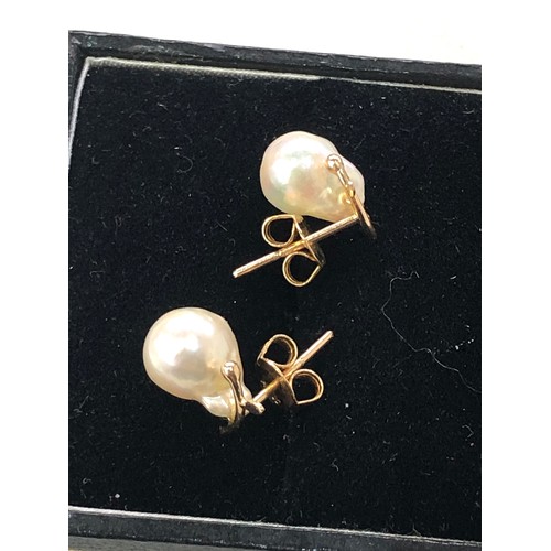 183 - 14ct gold baroque pearl pear studs