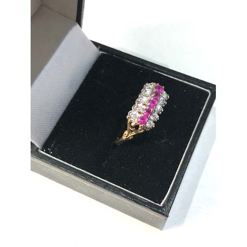 157 - 9ct gold fancy design pink & white gemstone ring weight 2.3g