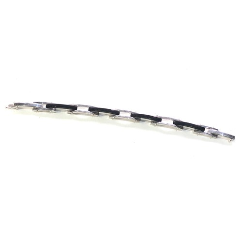 196 - 9ct white gold & black onyx modernist bracelet measures approx 18.5cm long 1.2cm wide weight 17g