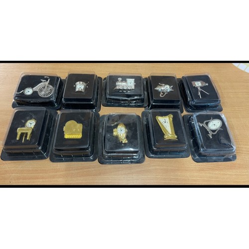 48 - Selection of ten miniature novelty clocks, untested