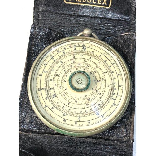 480 - Vintage Halden Calculex circular slide rule & original leather holder and booklet