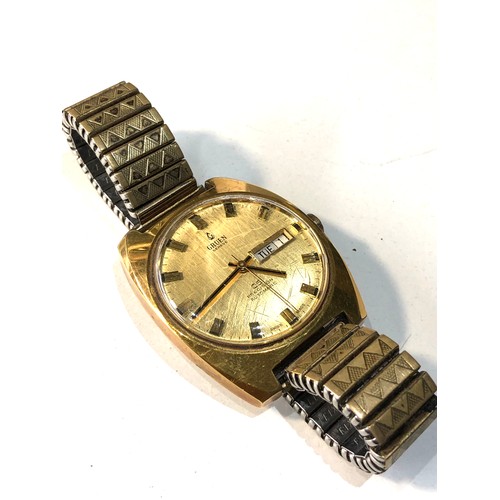 84 - Vintage Gruen Geneve 25 precision automatic day date gents  wristwatch the watch is ticking but no w... 