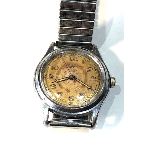 88 - Vintage military type Helvetia wristwatch the watch is ticking but no warranty given please see imag... 