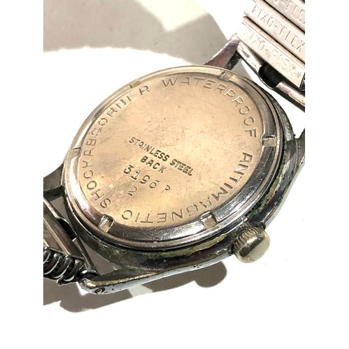 88 - Vintage military type Helvetia wristwatch the watch is ticking but no warranty given please see imag... 