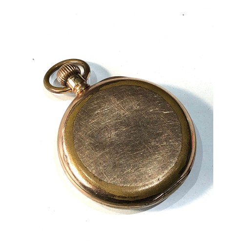 104 - Antique gold plated waltham traveler open face pocket watch  the watch does tick but no warranty giv... 