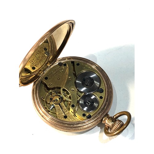 104 - Antique gold plated waltham traveler open face pocket watch  the watch does tick but no warranty giv... 