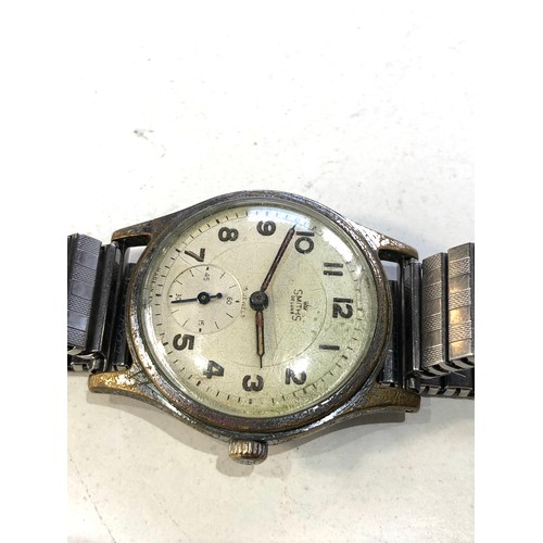 93 - Vintage Smiths deluxe gents wristwatch watch is ticking but no warranty given ahe related wear to ca... 