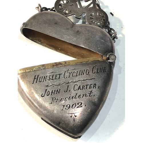 31 - Rare 1902 heart shapen cycling club vest /match striker with bike motif engrave hunslet cycling club... 