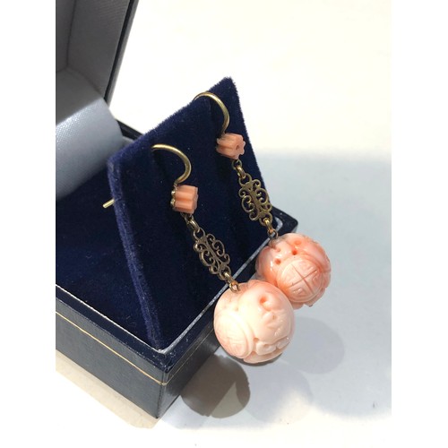 333 - 18ct Gold Carved pink Coral Earrings measure approx 3.5cm drop each carved coral drop measures appro... 