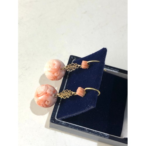 333 - 18ct Gold Carved pink Coral Earrings measure approx 3.5cm drop each carved coral drop measures appro... 