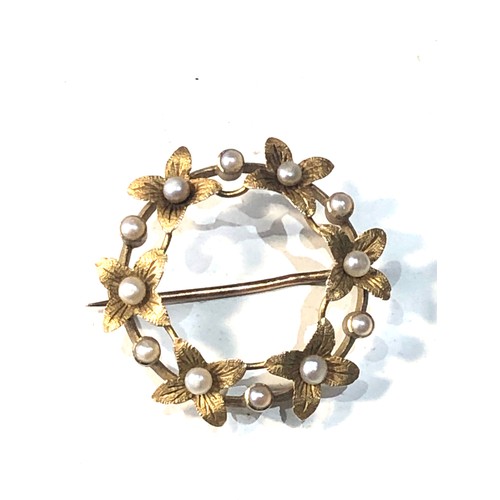 335 - Antique 15ct gold seedpearl petal brooch measures approx 2.5cm dia weight 2.5g hallmarked 15ct in go... 