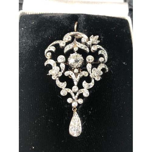 338 - Stunning  diamond pendant / brooch est 1.53ct of diamonds set in white and yellow gold central diamo... 