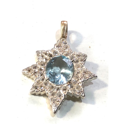 346 - Fine Aquamarine and diamond star pendant measures approx 3.2mm drop by 2.2cm wide central aquamarine... 