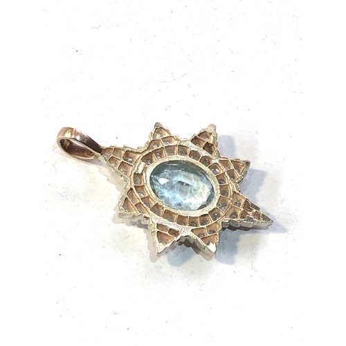 346 - Fine Aquamarine and diamond star pendant measures approx 3.2mm drop by 2.2cm wide central aquamarine... 