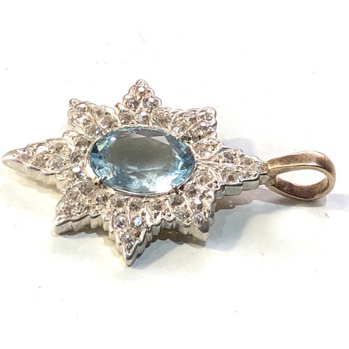 346 - Fine Aquamarine and diamond star pendant measures approx 3.2mm drop by 2.2cm wide central aquamarine... 