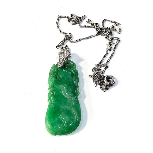 349 - Fine antique carved jade & diamond pendant with chain pendant measures approx 4.5cm drop set with .3... 