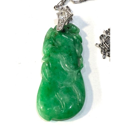 349 - Fine antique carved jade & diamond pendant with chain pendant measures approx 4.5cm drop set with .3... 