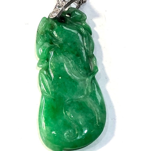 349 - Fine antique carved jade & diamond pendant with chain pendant measures approx 4.5cm drop set with .3... 