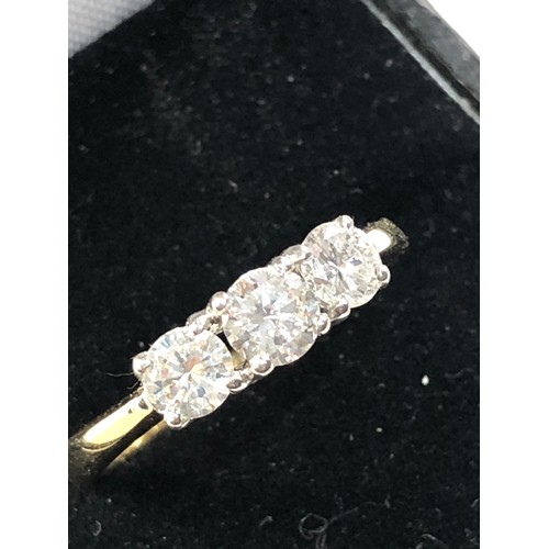 354 - 18ct gold diamond trilogy ring set with 3 diamonds 0.85ct good condition