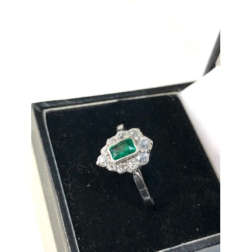 356 - Fine Platinum diamond an emerald ring central emerald 0.90ct with diamonds around 0.50ct