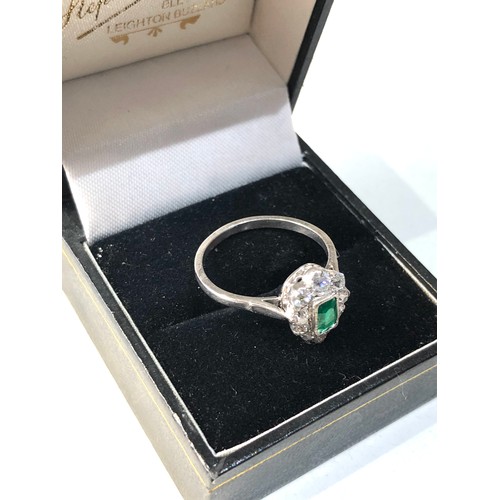 356 - Fine Platinum diamond an emerald ring central emerald 0.90ct with diamonds around 0.50ct