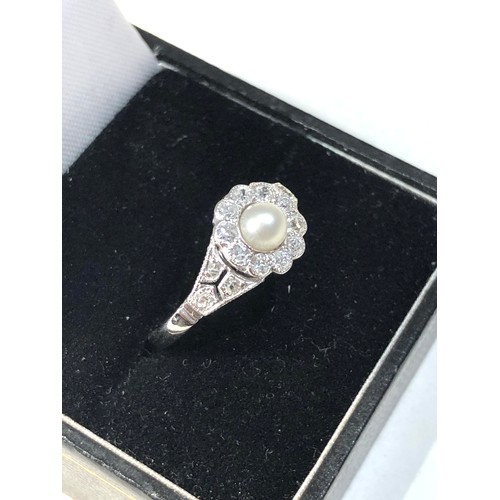 357 - Fine platinum diamond and pearl ring central pearl with diamonds around .35ct