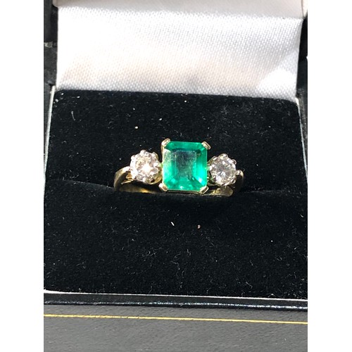 359 - Fine quality 18ct gold diamond and emerald ring central emerald 1.48ct with diamond either side 0.60... 