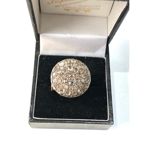 362 - Large gold diamond ring round head set with diamonds  all over est 1.20ct  measures approx 2.1cm dia... 