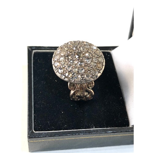 362 - Large gold diamond ring round head set with diamonds  all over est 1.20ct  measures approx 2.1cm dia... 