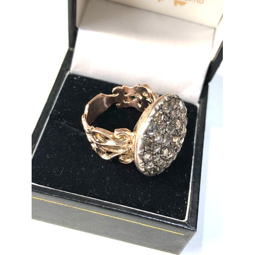 362 - Large gold diamond ring round head set with diamonds  all over est 1.20ct  measures approx 2.1cm dia... 