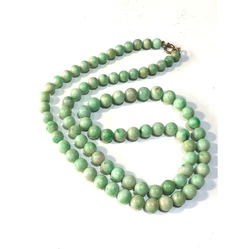 373 - Antique long jade bead necklace each bead measures approx 9mm dia measures 74cm long weight 101g gol... 