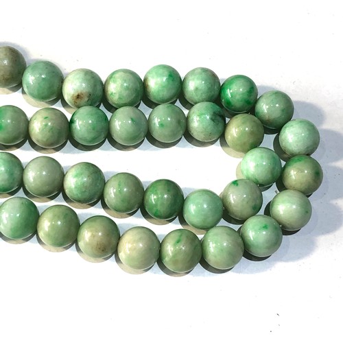 373 - Antique long jade bead necklace each bead measures approx 9mm dia measures 74cm long weight 101g gol... 