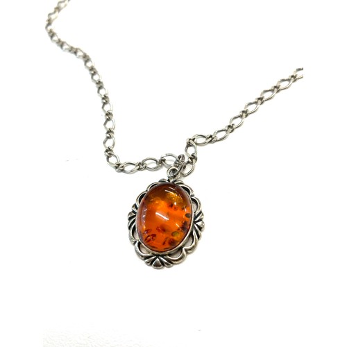 520 - Hallmarked silver and amber necklace