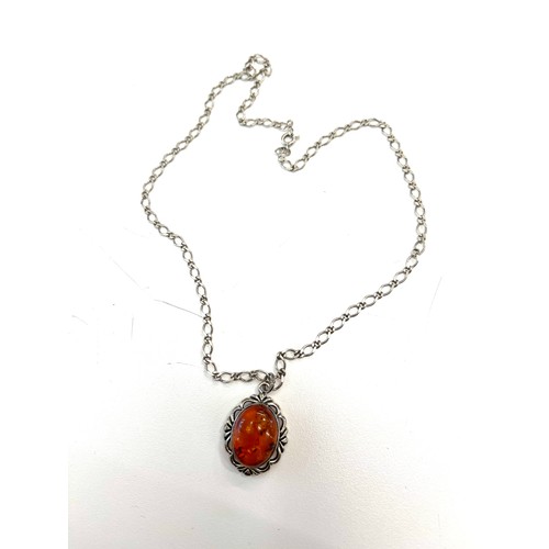 520 - Hallmarked silver and amber necklace