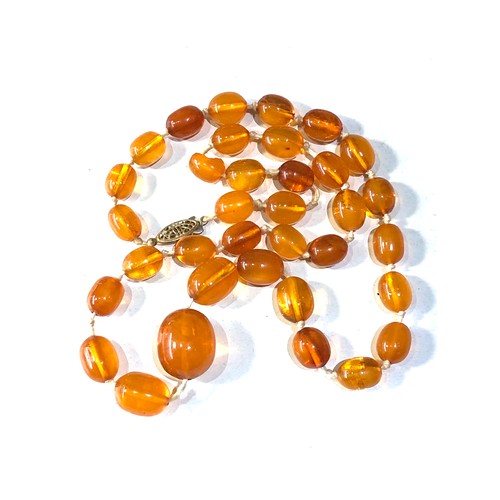 377 - Antique / vintage amber bead necklace weight 27g