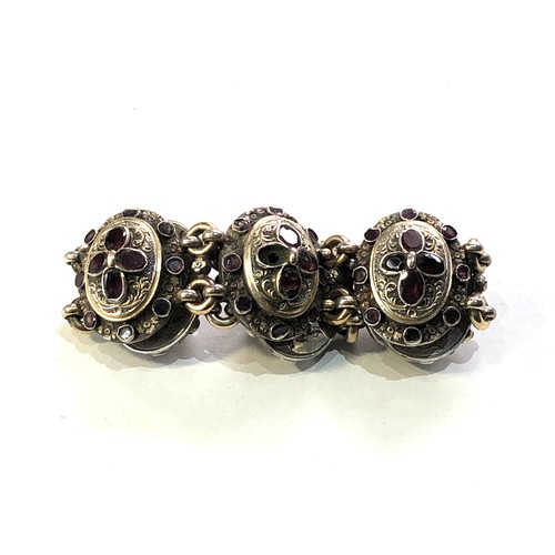 380 - Georgian silver table cut garnet bracelet gold gilt front each floral embossed panel set with garnet... 