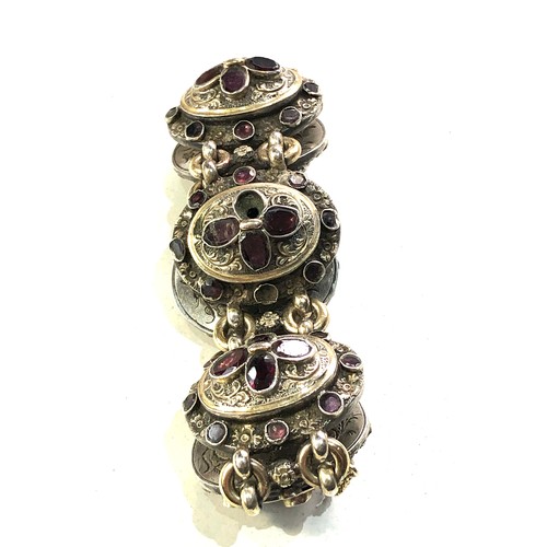 380 - Georgian silver table cut garnet bracelet gold gilt front each floral embossed panel set with garnet... 