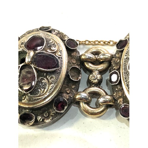 380 - Georgian silver table cut garnet bracelet gold gilt front each floral embossed panel set with garnet... 